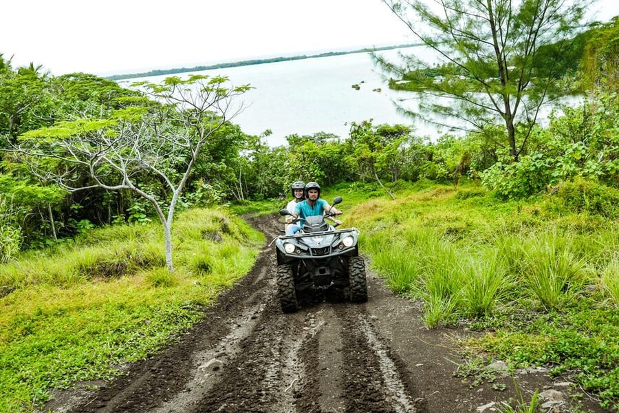 Bora Bora Adventures ATV / QUADS Tours - Fresh fruit, coconut water, and rainy-day reality