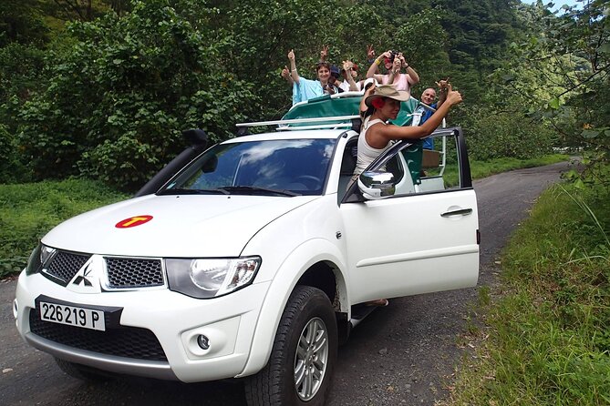 Crossing Over Tahiti Island Safari 4x4 - Waterfalls, streams, and mountain swimming