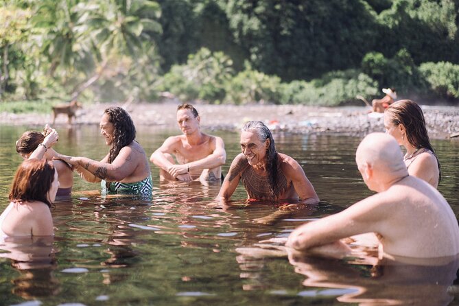 Explore old-fashioned Polynesian life and prepare a local meal - Grating Coconut and Making Lunch Together