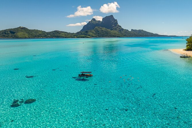 Full Day Eco Snorkeling & Traditional BBQ Lunch on a Motu - The highlights at a glance