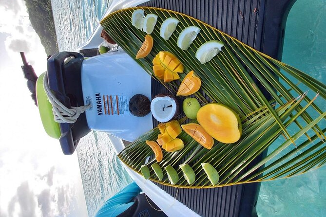 Maitai Tours Self-Drive Bora Bora Jet Ski Tour - Opening coconuts, fresh fruit, and local touches
