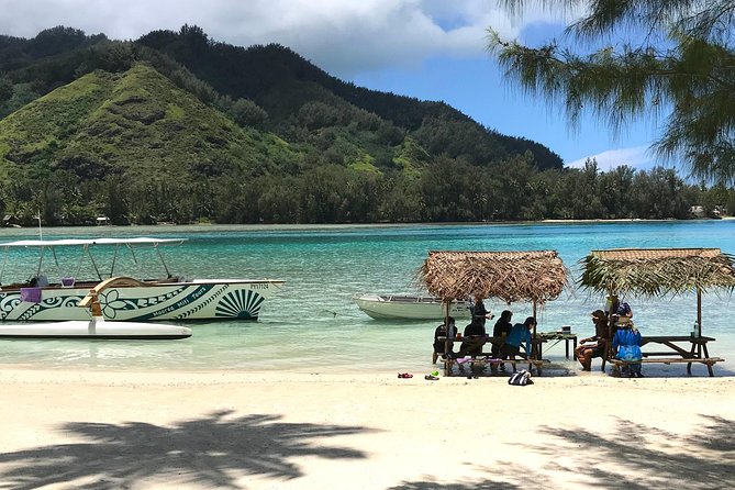Moorea 6-Hour Snorkeling and Lunch Shared Tour - Riding a traditional outrigger boat
