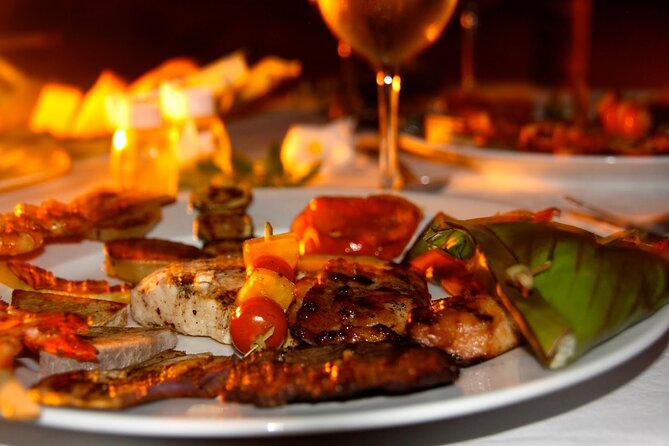 Romantic Private Sunset and Motu Dinner for Two - Arriving at a white-sand beach for dinner