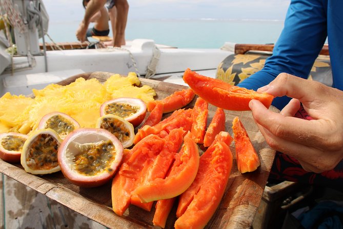 Sunset sailing - Tropical fruit, local snacks, and a cocktail