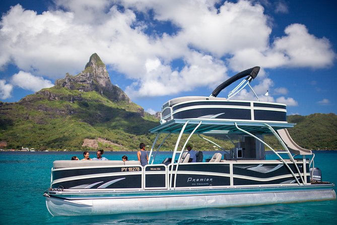 Toa Boat Bora Bora Private Lagoon tour with Lunch on Ambassador Boat - The slide and the three-seat towed buoy