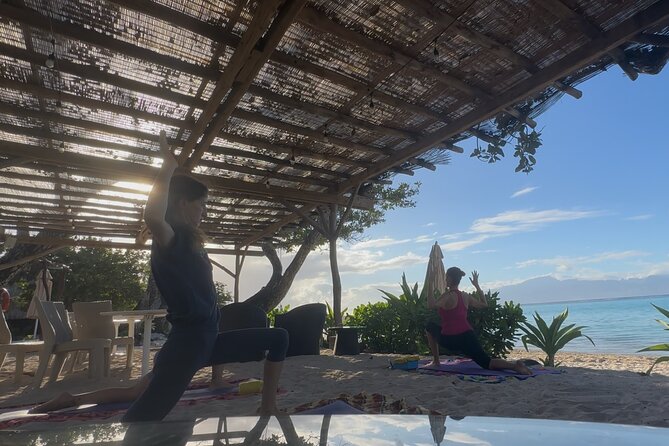 Yoga at sunrise at Sofitel Moorea, overlooking Tahiti - How to fit yoga into a day on Moorea